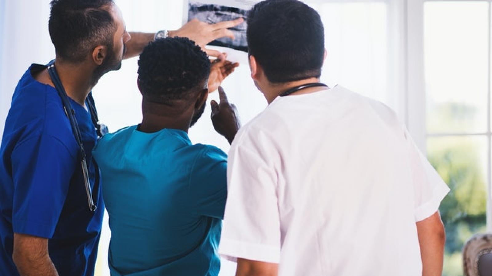 Healthcare professionals looking at an X-Ray