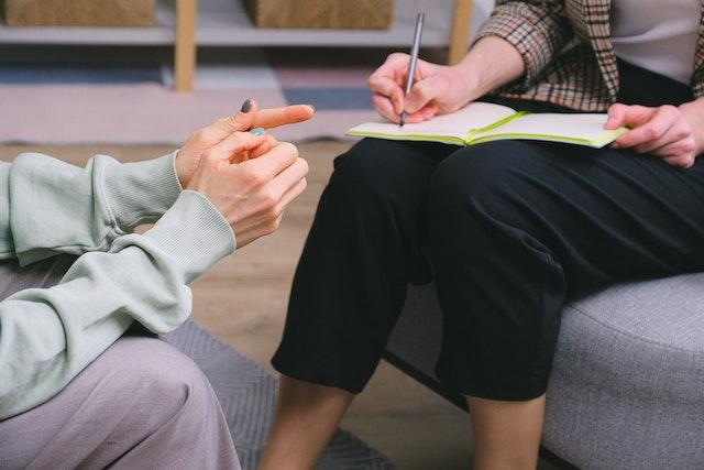 Occupational Therapist talking to patient